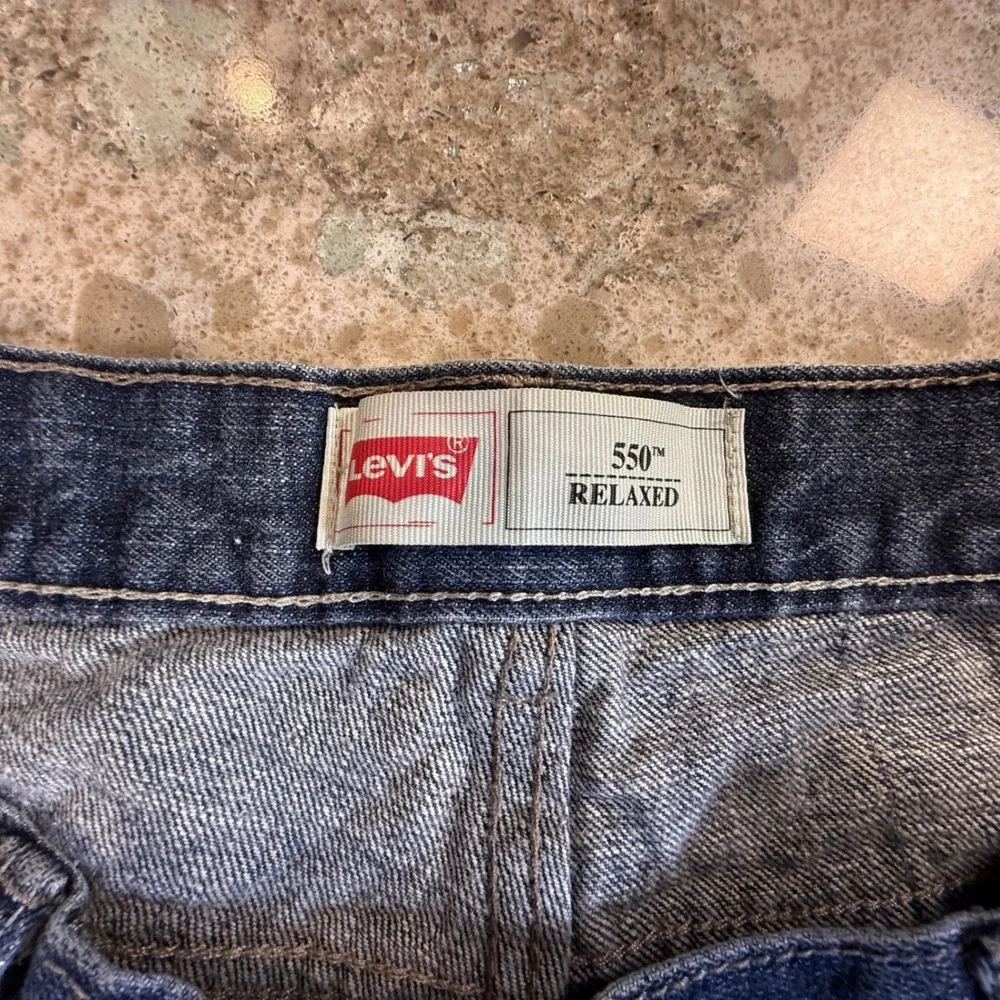 Levis 550 Relaxed Fit High Waisted Denim Cut Off‎ Shorts Medium Wash Blue Womens